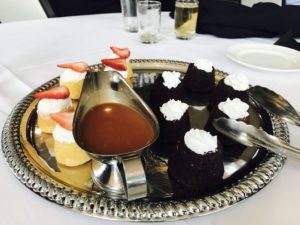 A tray of desserts on a table.